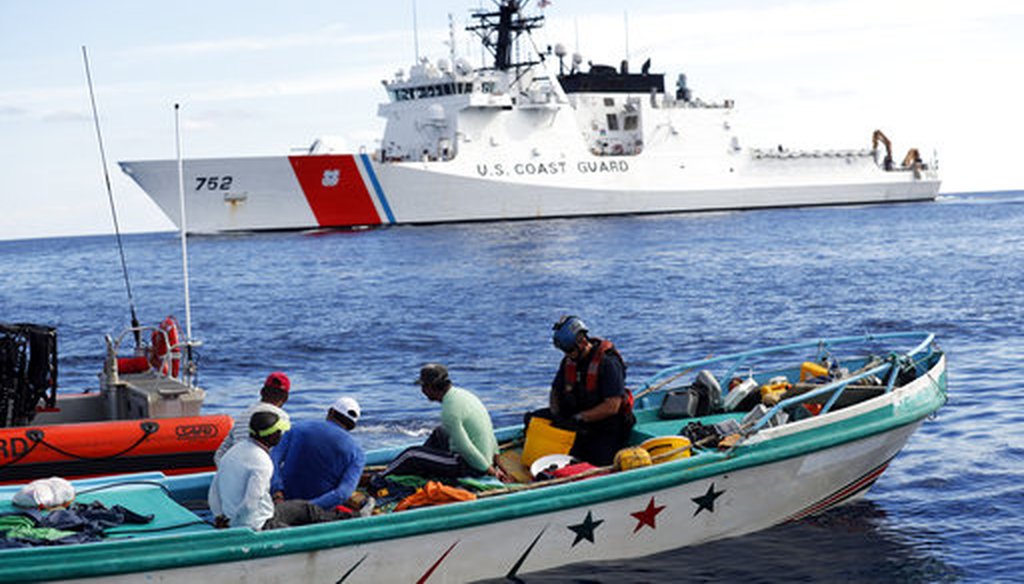 Feb. 23, 2017. U.S. Coast Guard law enforcement team boards a small fishing boat that was stopped carrying close to 700 kilos of pure cocaine, in the Pacific Ocean hundreds of miles south of the Guatemala-El Salvador border. (AP Photo/Dario Lopez-Mills)