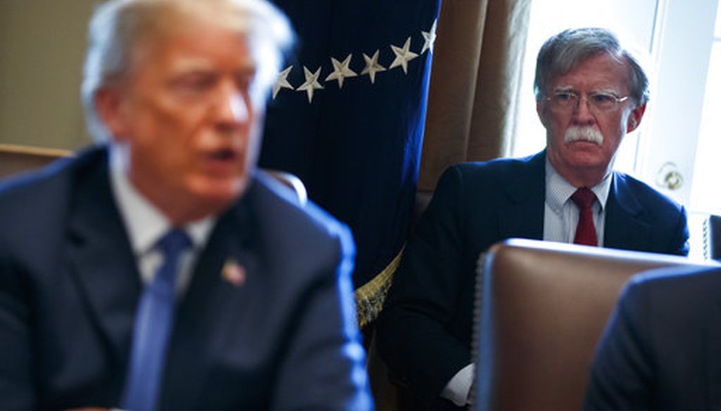 Former National Security Adviser John Bolton listens as President Donald Trump speaks during a cabinet meeting at the White House on April 9, 2018, in Washington. (AP/Vucci)