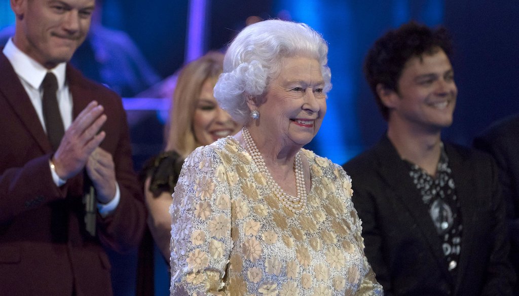 Queen Elizabeth II smiles on stage at the Royal Albert Hall in London on Saturday April 21, 2018, for a concert to celebrate her 92nd birthday. (David Mirzoeff/Pool via AP)