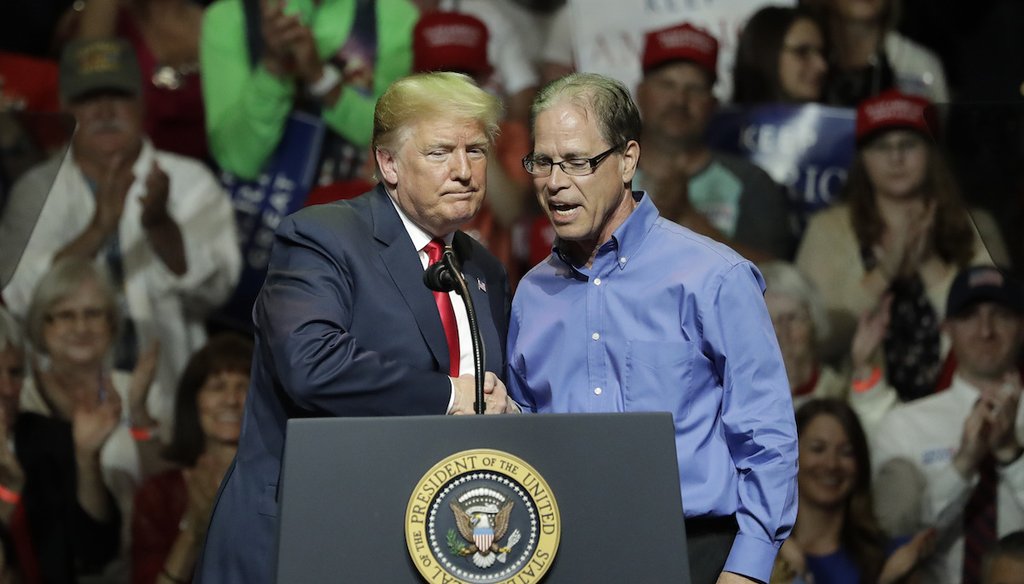Mike Braun, the Indiana GOP Senate candidate, celebrates his victory with President Donald Trump on May 10, 2018.