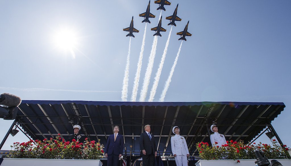 President Donald Trump looks on as the Blue Angels fly over the graduation ceremony at the U.S. Naval Academy on May 25, 2018, in Annapolis, Md. (AP)