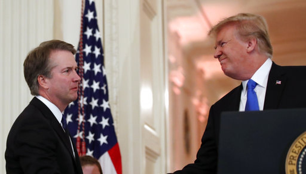 President Donald Trump shakes hands with Judge Brett Kavanaugh, his Supreme Court nominee, in the East Room of the White House, July 9, 2018. (AP Photo/Alex Brandon)