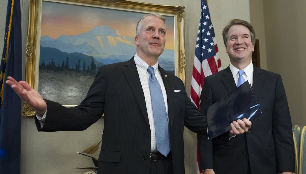 Supreme Court nominee Brett Kavanaugh stands with Sen. Dan Sullivan, R-Alaska, on Capitol Hill in Washington on July 12, 2018.