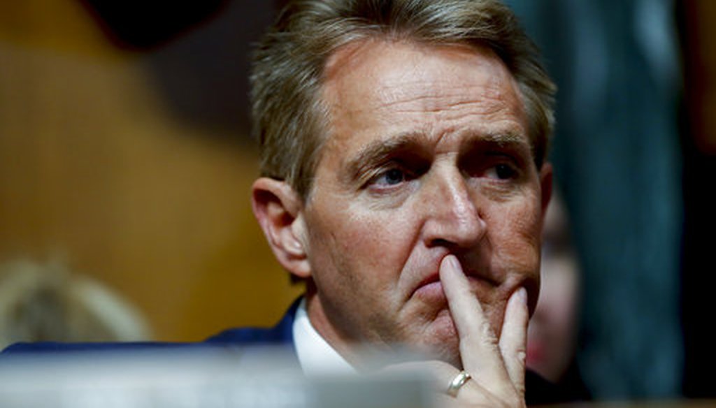 Sen. Jeff Flake, R-Ariz., attends a Senate Judiciary Committee meeting, Friday, Sept. 28, 2018 on Capitol Hill in Washington (AP Photo/Pablo Martinez Monsivais)