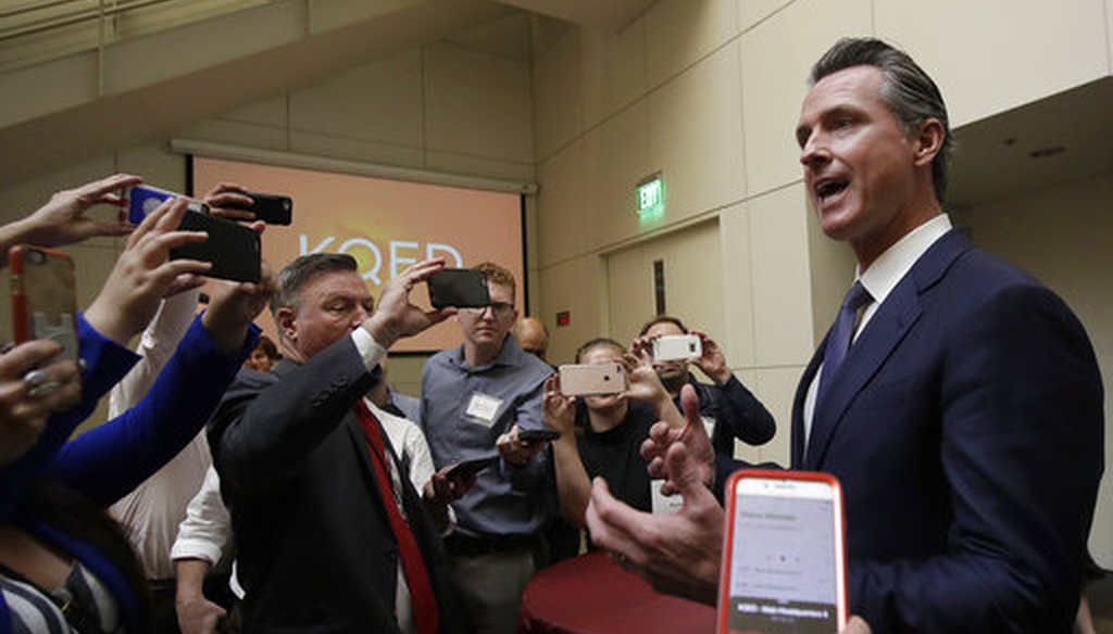 Democratic candidate Gavin Newsom, right, speaks with reporters after a California gubernatorial debate with Republican candidate John Cox at KQED Public Radio Studio in San Francisco on Oct. 8, 2018. (AP/Jeff Chiu, Pool)