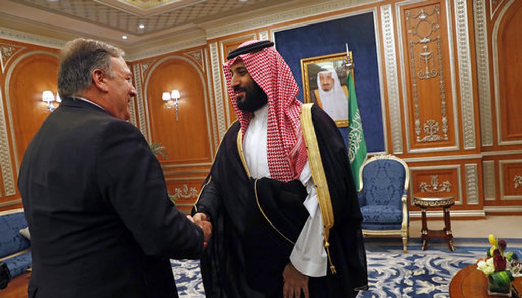 U.S. Secretary of State Mike Pompeo shakes hands with the Saudi Crown Prince Mohammed bin Salman in Riyadh, Saudi Arabia, Oct. 16, 2018. (Leah Millis/Pool via AP)