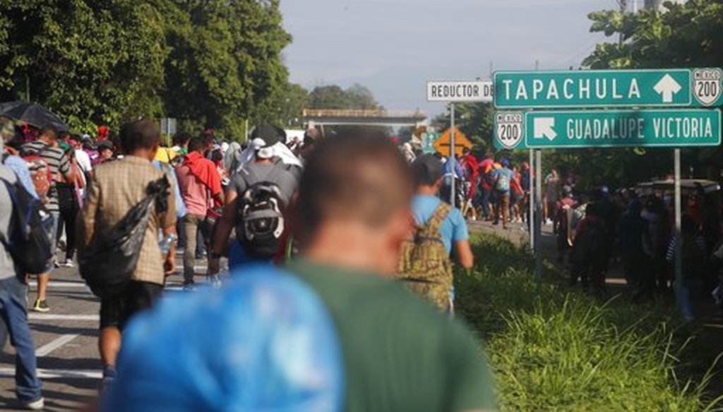 Central American migrants walk north toward Tapachula, after departing Ciudad Hidalgo, Mexico, Sunday, Oct. 21, 2018. (AP Photo/Moises Castillo)