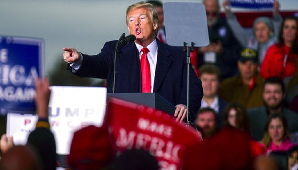 President Donald Trump speaks at a rally on Nov. 2, 2018, at the Tri-State Airport in Huntington, W.Va. (AP/Tyler Evert)