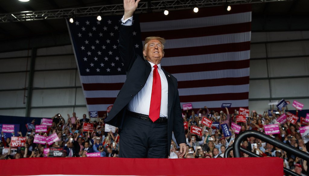 President Donald Trump arrives to speak at a campaign rally, Sunday, Nov. 4, 2018, in Macon, Ga. (AP Photo/Evan Vucci)