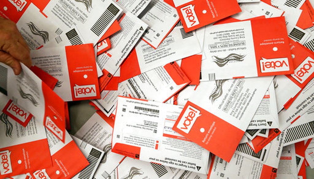 A batch of ballots collected from drop boxes at the King County Elections office in Renton, Wash. (AP)