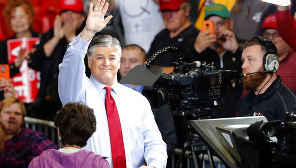 Sean Hannity waves at the audience before the start of a Trump campaign rally Nov. 5, 2018, in Cape Girardeau, Mo. (AP/Roberson)