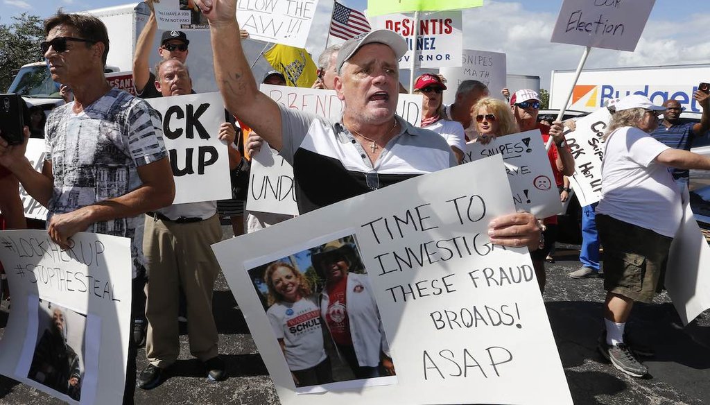 A crowd protests outside the Broward County Supervisor of Elections office in Lauderhill, Fla., on Nov. 9, 2018. (AP)