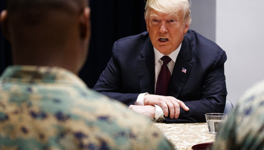 President Donald Trump visits with Marines at Marine Barracks Washington, Thursday, Nov. 15, 2018, in Washington. (AP Photo/Evan Vucci)