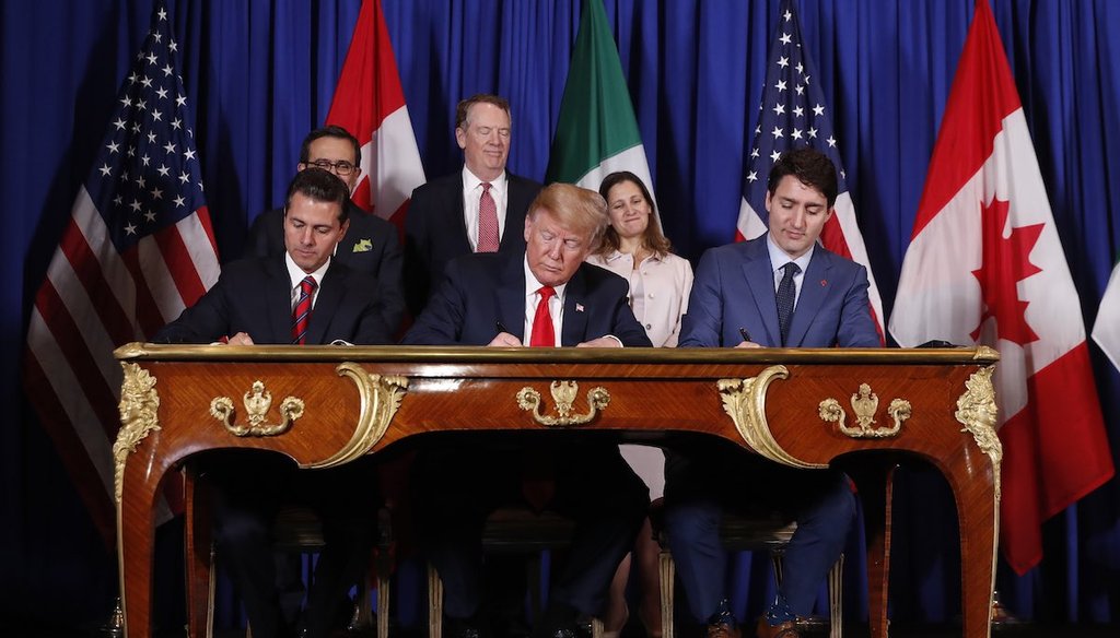 President Donald Trump, Canada's Prime Minister Justin Trudeau and Mexico's President Enrique Pena Nieto, participate in the USMCA signing ceremony at G20 in Buenos Aires, Argentina on Nov. 30, 2018.