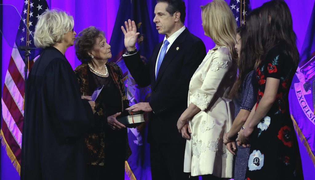 New York Gov. Andrew Cuomo takes his third oath of office, on Ellis Island in New York harbor, Tuesday, Jan. 1, 2019. (AP)