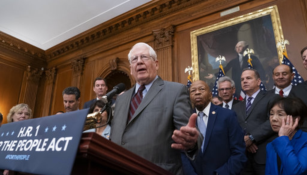 Rep. David Price, D-N.C., joins other House Democrats to unveil a comprehensive elections and ethics reform package on Jan. 4, 2019. (AP/J. Scott Applewhite)