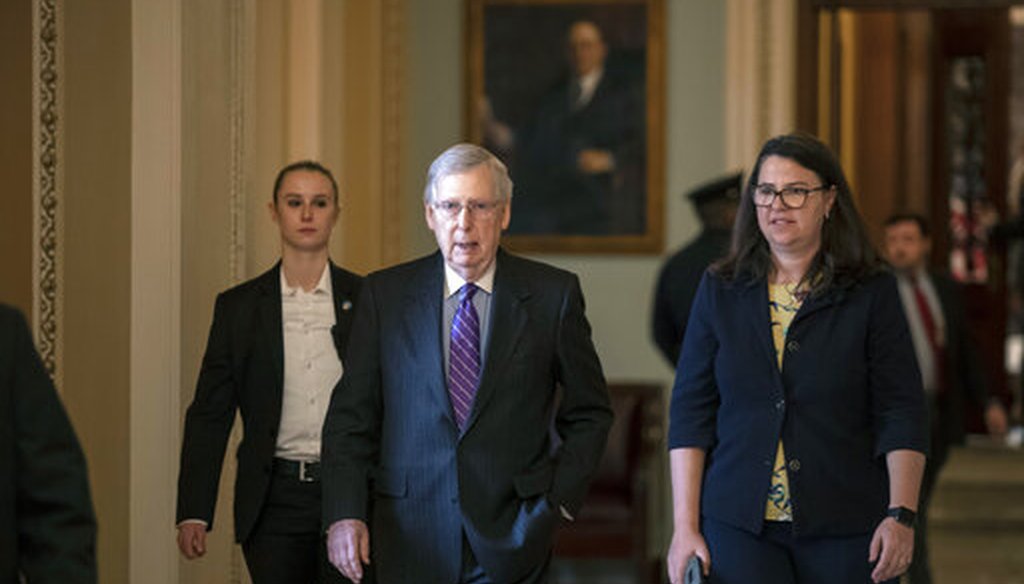 Senate Majority Leader Mitch McConnell, R-Ky., and Secretary for the Majority Laura Dove, right, in the U.S. Capitol on Jan. 23, 2019. (AP)