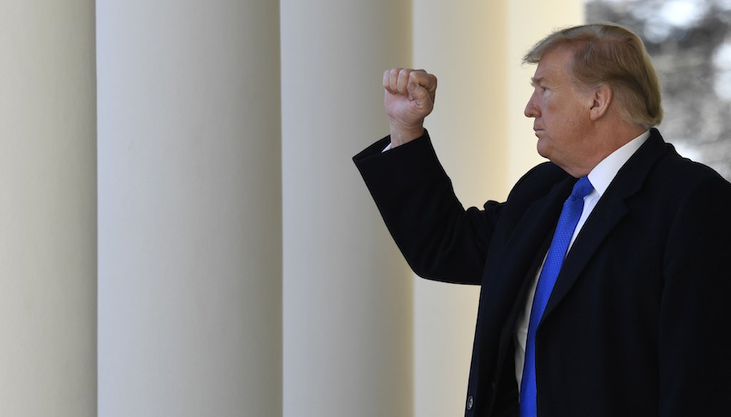 President Donald Trump gestures to the audience as he heads to the Oval Office after speaking during an event in the Rose Garden at the White House on Feb. 15, 2019, to declare a national emergency in order to build a wall. (AP)