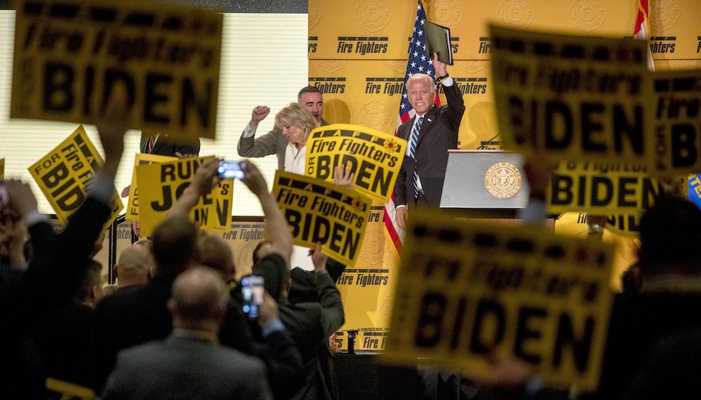 Joe Biden waves as he speaks with International Association of Firefighters in Washington, Tuesday, March 12, 2019. (AP)