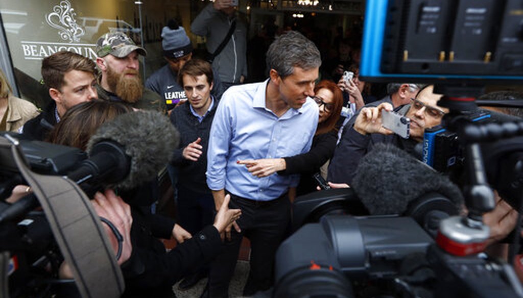 Former Texas congressman Beto O'Rourke speaks to reporters after a meet and greet at the Beancounter Coffeehouse & Drinkery, Thursday, March 14, 2019, in Burlington, Iowa. (AP Photo/Charlie Neibergall)