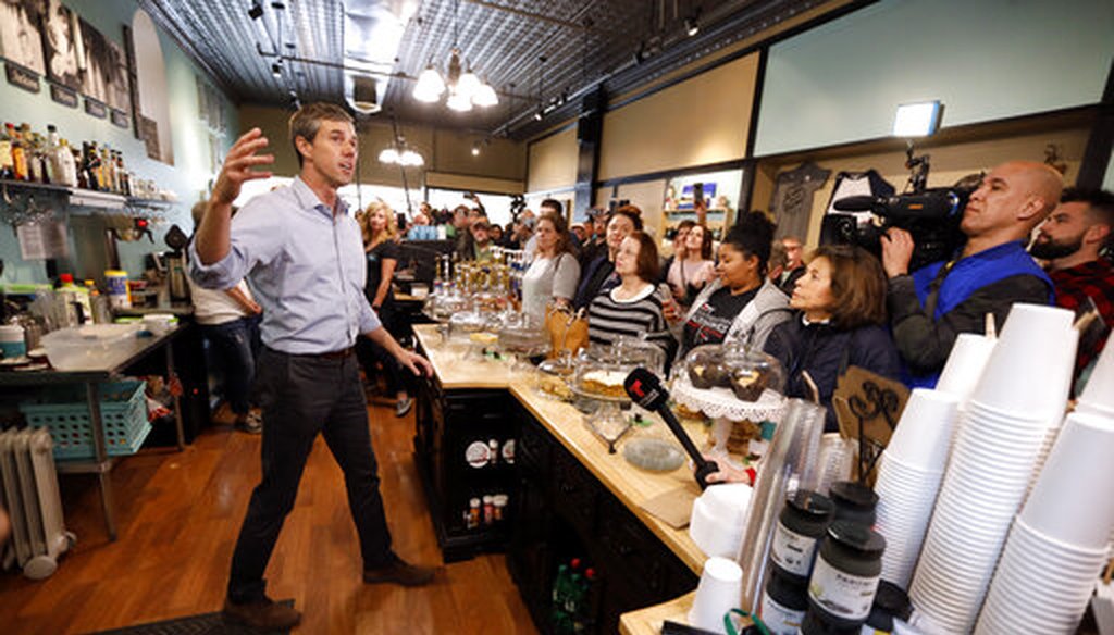 Former Texas congressman Beto O'Rourke speaks to local residents during a meet and greet at the Beancounter Coffeehouse & Drinkery, March 14, 2019, Burlington, Iowa. (AP Photo/Charlie Neibergall)