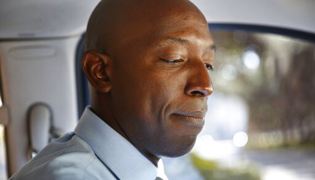In this March 27, 2019 photo, Miramar Mayor Wayne Messam sits in a car during a tour of Miramar in Miramar, Fla. Messam announced on March 28, 2019 that he is running for the Democratic presidential nomination. (AP Photo/Brynn Anderson)