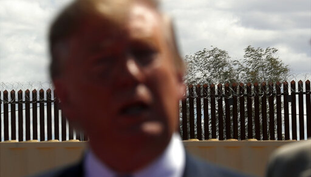 President Donald Trump speaks as he visits a new section of border barriers in Calexico, Calif.,  April 5, 2019. (AP/Jacquelyn Martin)