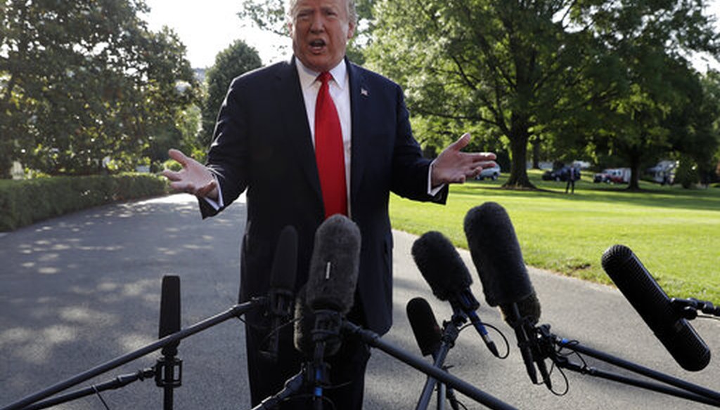 President Donald Trump talks with reporters on the White House lawn on May 30, 2019. (AP)
