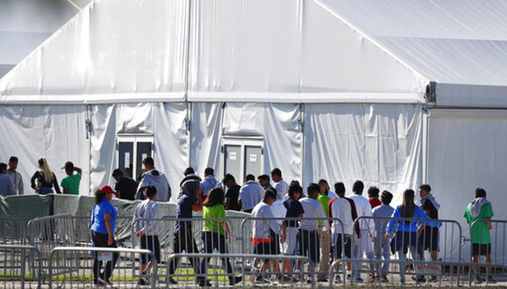 In this Feb. 19, 2019 file photo, children line up to enter a tent at the temporary shelter for unaccompanied children in Homestead, Fla. (AP)
