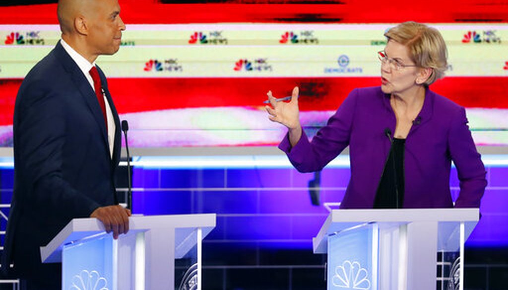 Democratic presidential candidates Elizabeth Warren and Cory Booker both criticized the state of the economy during a Democratic primary debate on June 26, 2019. (AP)