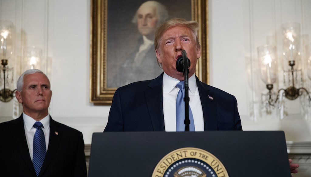Vice President Mike Pence listens as President Donald Trump speaks about the mass shootings in El Paso, Texas, and Dayton, Ohio, in the Diplomatic Reception Room of the White House on Aug. 5, 2019, in Washington. (AP)