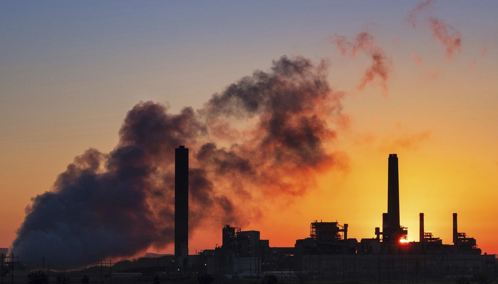 In this July 27, 2018, file photo, the Dave Johnson coal-fired power plant is silhouetted against the morning sun in Glenrock, Wyo. (AP)