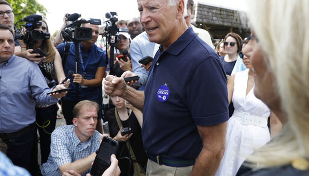 Democratic presidential candidate former Vice President Joe Biden speaks to reporters during the Hawkeye Area Labor Council Labor Day Picnic, Sept. 2, 2019, in Cedar Rapids, Iowa. (AP/Charlie Neibergall)