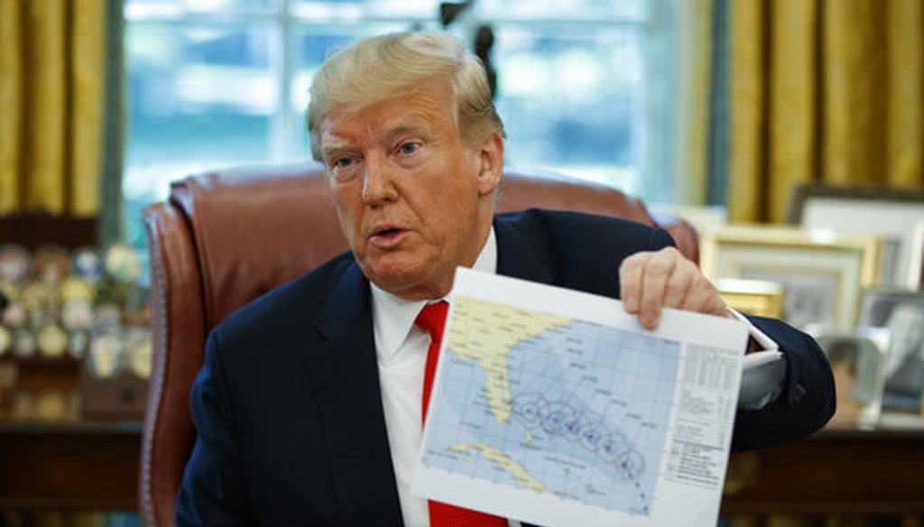 President Donald Trump talks with reporters after receiving a briefing on Hurricane Dorian in the Oval Office of the White House, Sept. 4, 2019, in Washington. (AP)