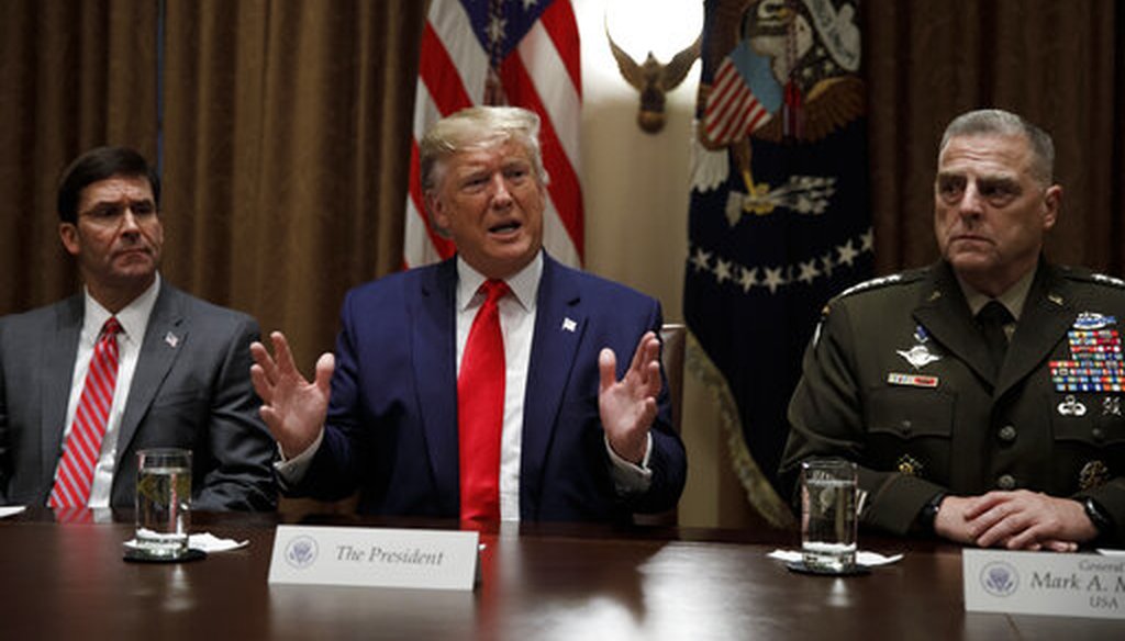 President Donald Trump, joined by Defense Secretary Mark Esper and Chairman of the Joint Chiefs of Staff Gen. Mark Milley, speaks during a briefing with senior military leaders at the White House on Oct. 7, 2019. (AP/Kaster)