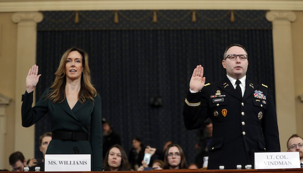 Jennifer Williams, an aide to Vice President Mike Pence, left, and National Security Council aide Lt. Col. Alexander Vindman, are sworn in to testify before the House Intelligence Committee. (AP)