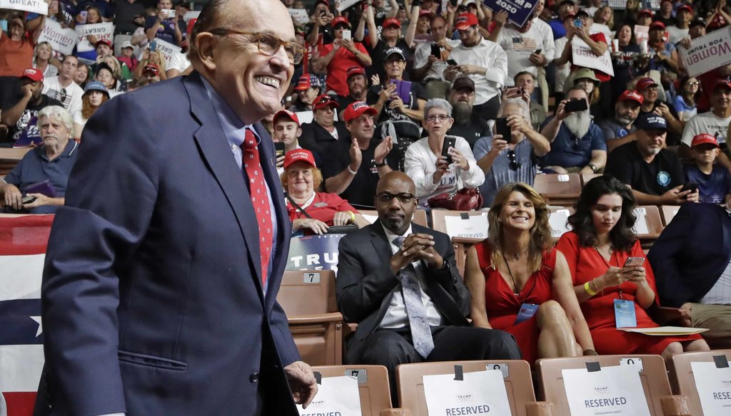 In this Aug. 15, 2019, file photo, former New York City Mayor Rudy Giuliani smiles as he arrives to President Donald Trump's campaign rally in Manchester, N.H. (AP)