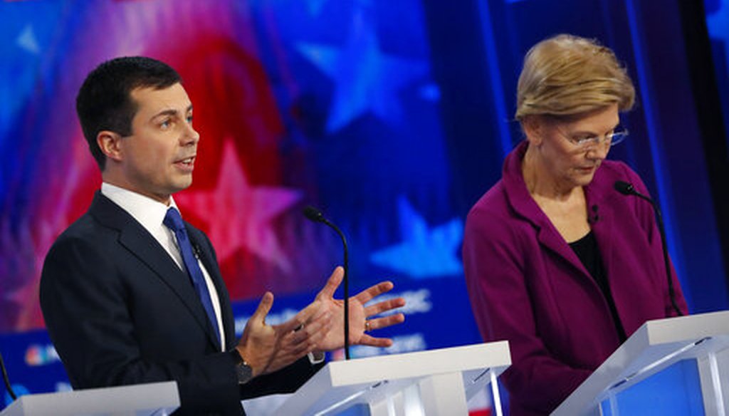 Democratic presidential candidate South Bend, Ind., Mayor Pete Buttigieg, left, speaks as Democratic presidential candidate Sen. Elizabeth Warren, D-Mass., listens, during a primary debate, Nov. 20, 2019, in Atlanta. (AP/John Bazemore)
