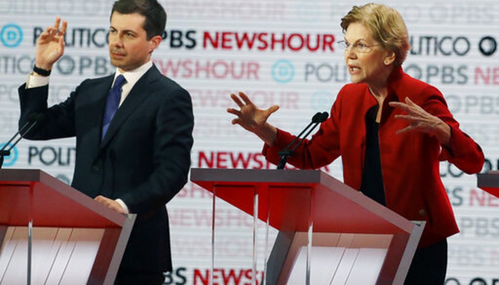 Democratic presidential candidate Sen. Elizabeth Warren, D-Mass., speaks as South Bend Mayor Pete Buttigieg listens during a Democratic presidential primary debate, Dec. 19, 2019, in Los Angeles. (AP/Chris Carlson)