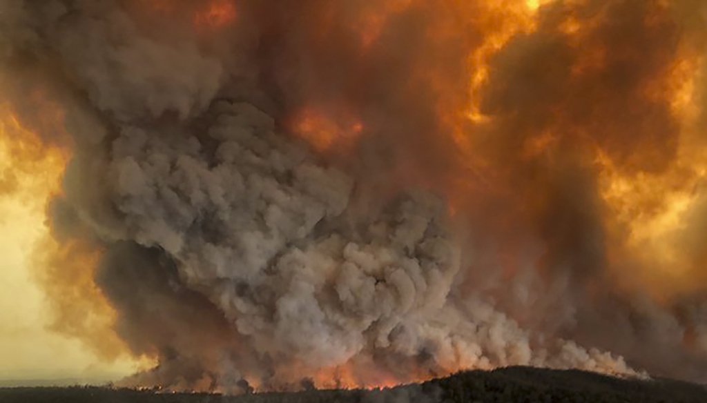 In this Dec. 30, 2019, aerial photo, wildfires rage under plumes of smoke in Bairnsdale, Australia. (AP)