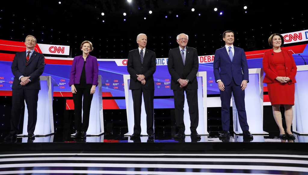 Democratic presidential candidates stand on stage Jan. 14, 2020, before a Democratic presidential primary debate hosted by CNN and the Des Moines Register in Des Moines, Iowa. (AP)
