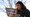 Karina Shumate, 21, a college student studying stenography, fills out a voter registration form in Richardson, Texas, on Jan. 18, 2020. (AP)