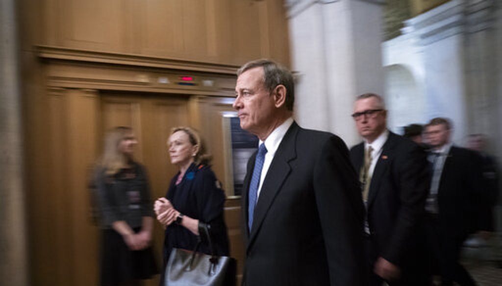 Chief Justice John Roberts leaves the Senate following arguments in the impeachment trial of President Donald Trump in Washington on Jan. 25, 2020. (AP/Applewhite)