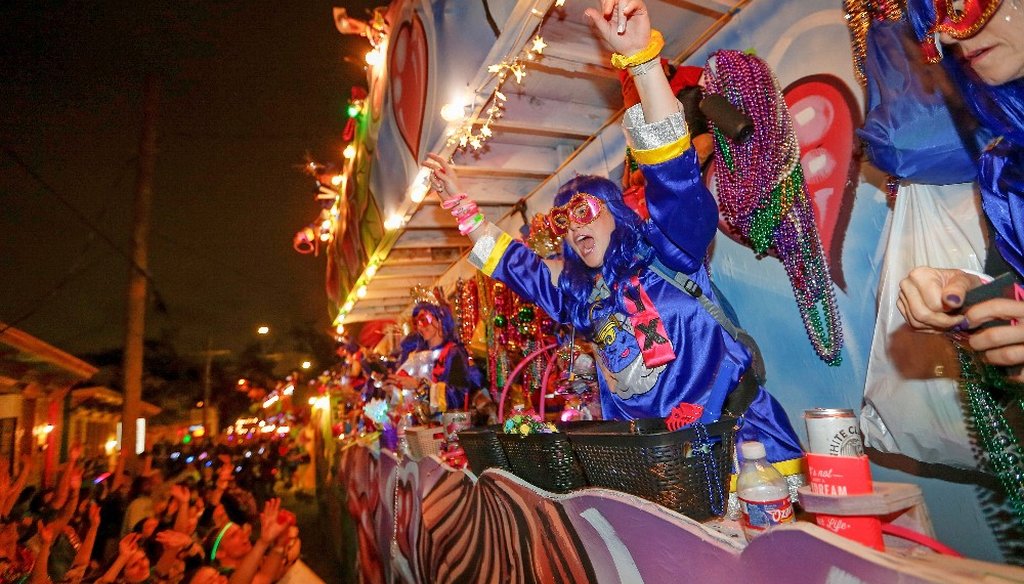 The Mystic Krewe of Nyx parade makes its way through the streets during Mardi Gras celebrations in New Orleans, Wednesday, Feb. 19, 2020. Carnival season culminated on Fat Tuesday, Feb. 25, 2020. (AP)