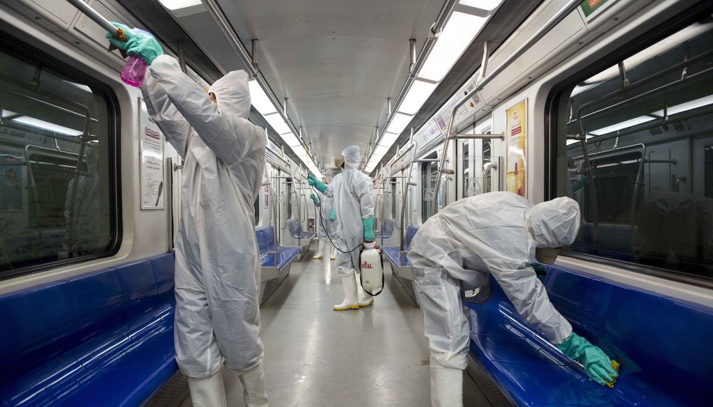 Workers disinfect subway trains against coronavirus in Tehran, Iran, in the early morning of Feb. 25, 2020. (AP)