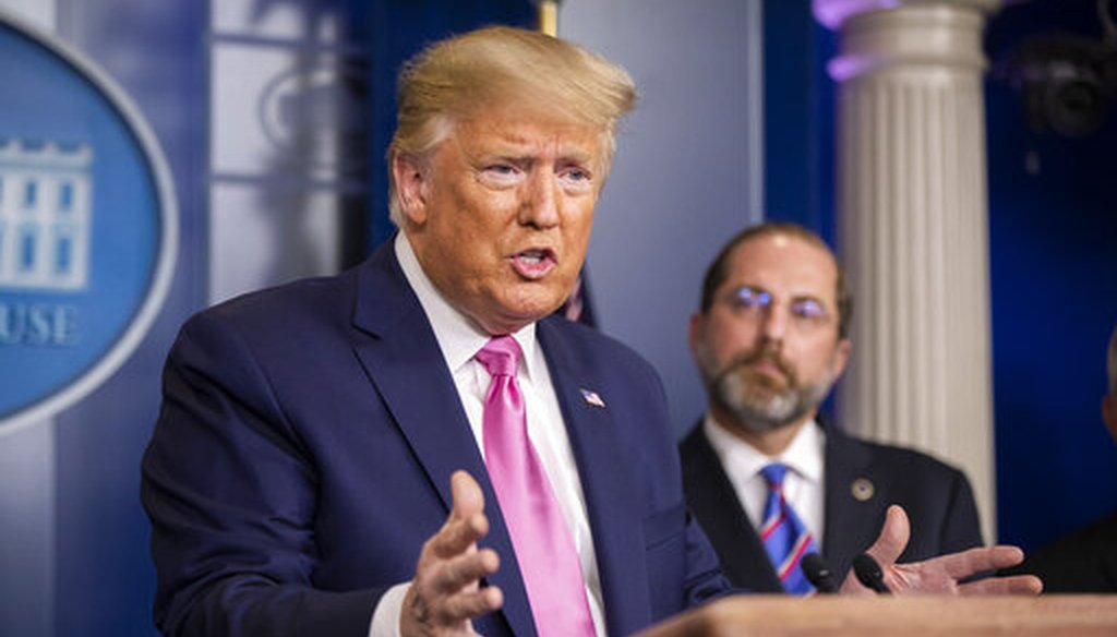 President Donald Trump, with Department of Health and Human Services Secretary Alex Azar to his right, speaks during a press conference on the coronavirus on Feb. 26, 2020 in Washington. (AP/Ceneta)