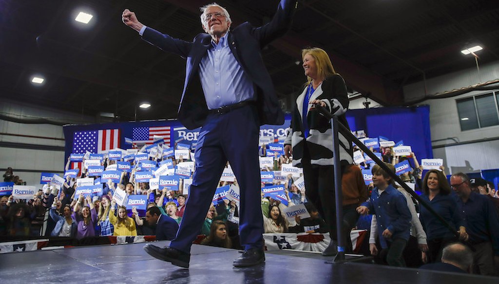 Democratic presidential candidate Sen. Bernie Sanders, I-Vt., accompanied by his wife Jane O'Meara Sanders, speaks during a primary night election rally in Essex Junction, Vt. (AP Photo/Matt Rourke)