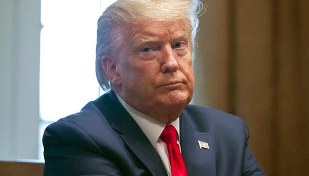 President Donald Trump listens a meeting with nurses in the White House on March 18, 2020, in Washington. (AP/Brandon)