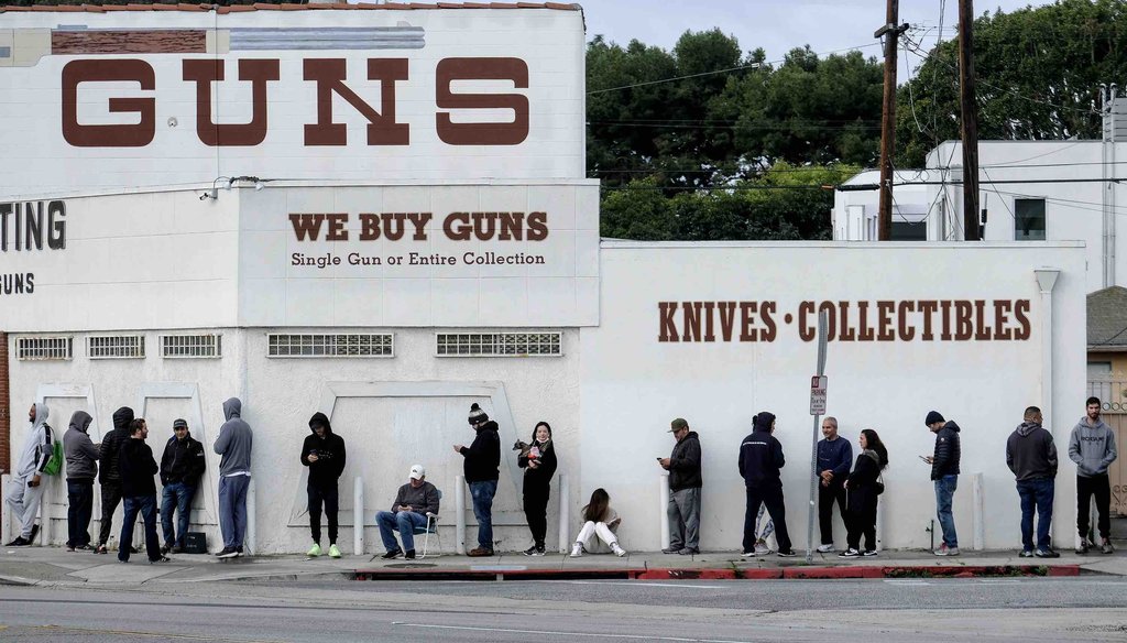 In this March 15, 2020, file photo, people wait in line to enter a gun store in Culver City, Calif. (AP)