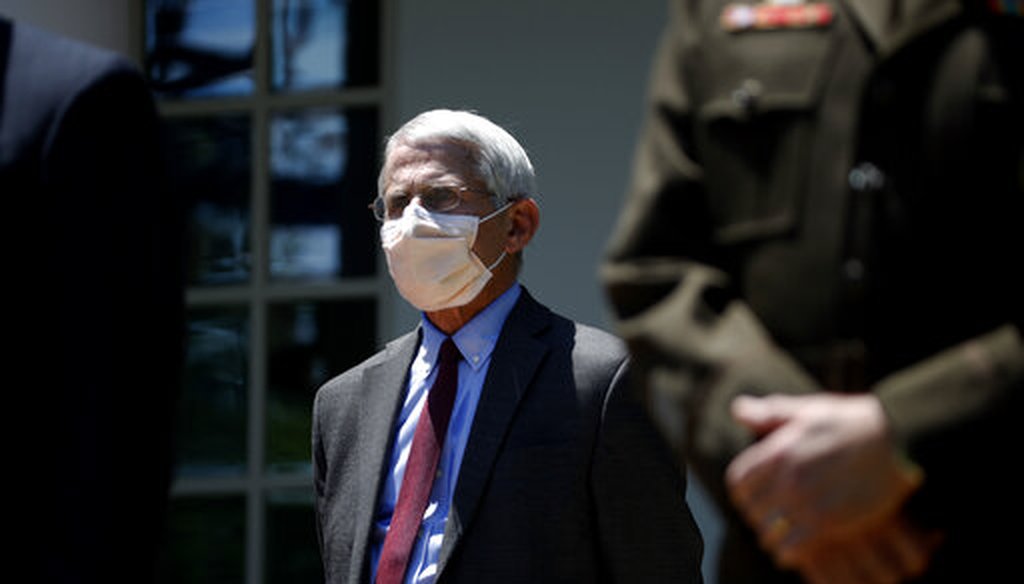 Dr. Anthony Fauci, director of the National Institute of Allergy and Infectious Diseases, listens as President Donald Trump speaks about the coronavirus in the Rose Garden of the White House on May 15, 2020. (AP)